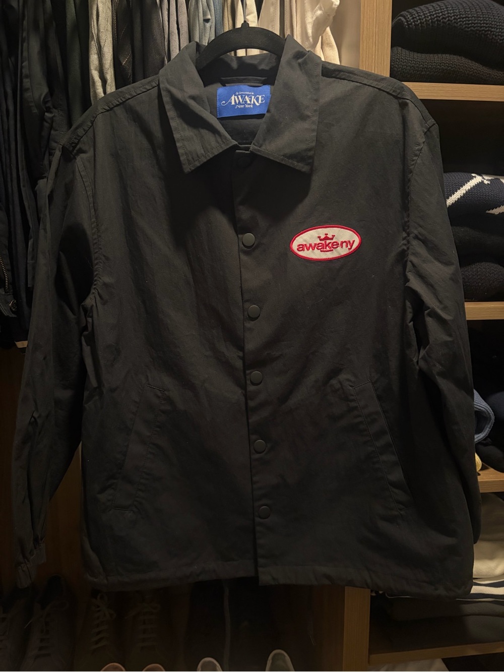 Awake NY Black Coach Jacket with Red Logo Patch